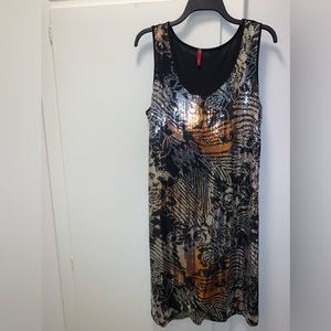 Sequins front cocktail dress. Solid black back.